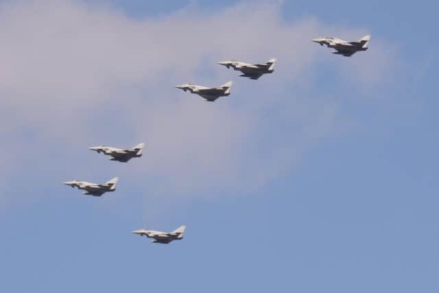 Typhoons cruise overhead in the flypast procession.
