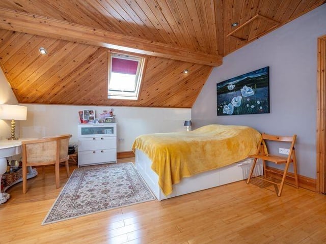One of the first-floor bedrooms.