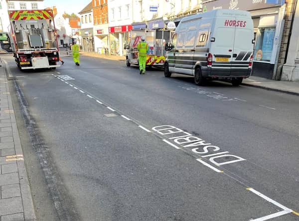 Workers put the bays back on Tuesday. | Image: LCC