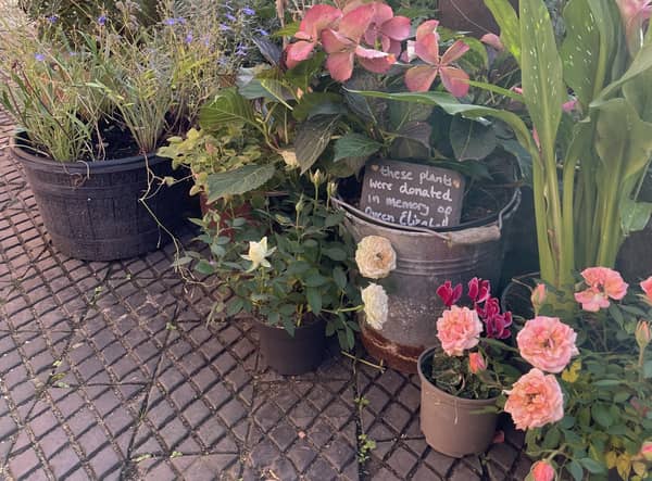 Plants left in tribute to the Queen on her death have been transplanted to the garden at Mrs Smith's Cottage, Navenby.