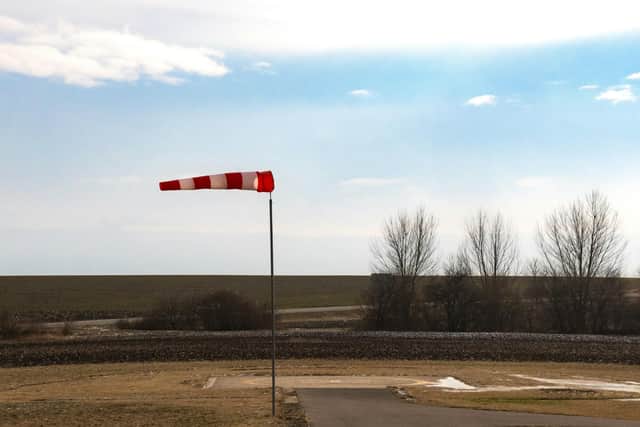 Strong winds can make driving unpredictable, especially on open roads or when overtaking larger vehicles so you should reduce your speed to stay in control.