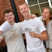 QEGS A Level students receive their results, from left: Archie Head, Cameron Ball, and Tyla Burton.