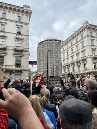 The funeral procession goes past the South Carriage Drive area of Hyde Park on the way to Westminster Abbey.