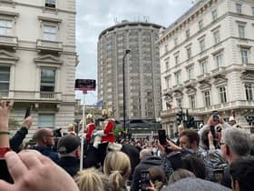 The funeral procession goes past the South Carriage Drive area of Hyde Park on the way to Westminster Abbey.