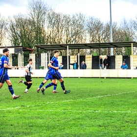 Dylan Wharton denies Atherton's Jordan Scanlon. Photo by David Featherstone (ACFC).