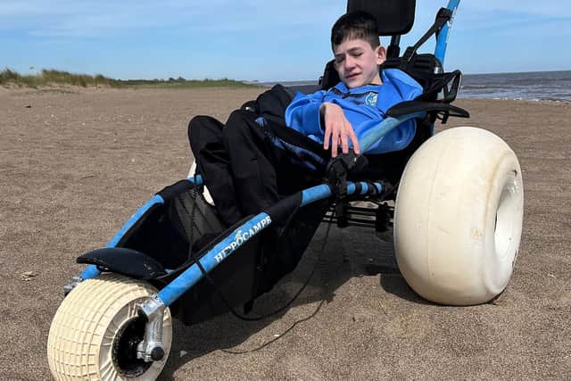 Fifteen-year-old Oliver Ellison can now get on to the beach much more easily. (PHOTO BY: Lincolnshire County Council)
