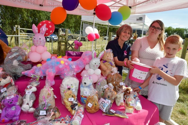 Pictured at the raffle stall are, from left, Debbie Huggett, Kristina Cannell and Oliver Sullivan, aged 10.