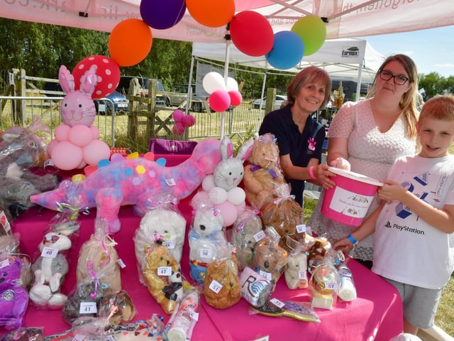 Pictured at the raffle stall are, from left, Debbie Huggett, Kristina Cannell and Oliver Sullivan, aged 10.