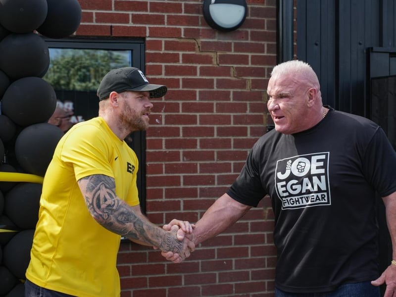 'Big Joe' shaking hands with Boston's boxing hero Callum Johnson, co-founder of Elev8 Fitness.