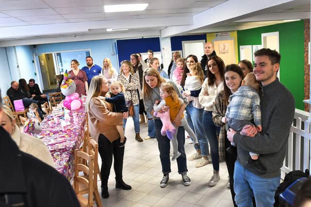 Guests enjoy Lily's birthday party.