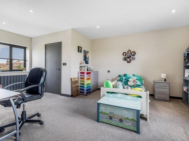 One of the other bedrooms and ...