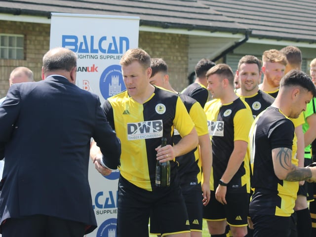 Ollie Pinner has his champagne ready.