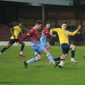 Scunthorpe United's youngsters pipped Gainsborough Trinity to lift the Lincs Senior Trophy, but the first team were relegated from League Two.