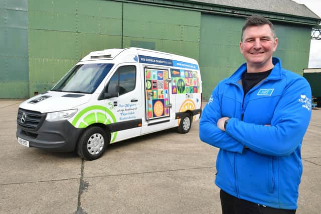 Operations Director, Richard Humphrey with the new multi-temperature van following a £25,000 Comic Relief donation.