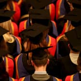 File photo dated 19/10/2015 of a general view of a graduation ceremony at University Campus Suffolk in Ipswich. An over-reliance on tuition fees from overseas students - especially those from a single country such as China - is a financial risk for English universities, the higher education watchdog has warned. Issue date: Thursday May 18, 2023.