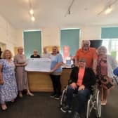 Organisers at the cheque presentation, including Richard and Sally Osmond (far Rright), founding Pastors of the New Life Community Church.