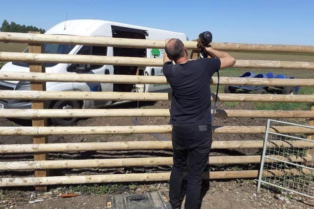 Jason Miluka of Farm Linc mending the damaged fence at Tattershall Farm Park.