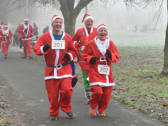 Action from this year's Boston Santa Run.