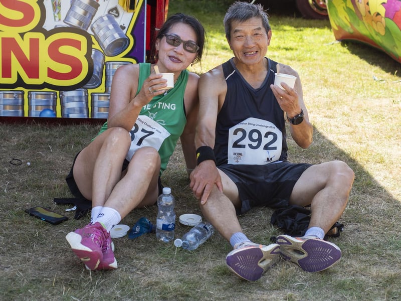Taking a well-earned rest after a hot run. Lisa Chan and Sam Liu from Nottingham. Photo: Holly Parkinson