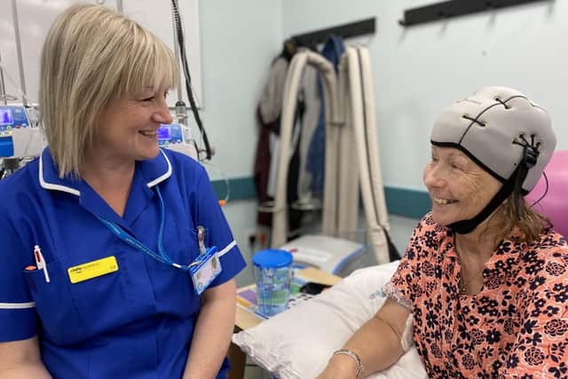 Sharon Wilkinson receiving her treatment with Deputy Sister, Liz Timms, on Ingham Suite