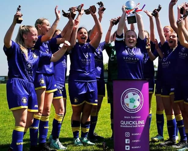 Gainsborough Trinity U16 Women celebrate their cup victory.
