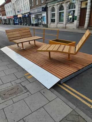 The controversial parklets from the Active Travel Scheme.