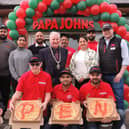 Mayor of Sleaford Coun Antony Brand joins Simran, Sukhy and Kam Bains and staff at the opening of the new Papa Johns takeaway pizza store in Sleaford.