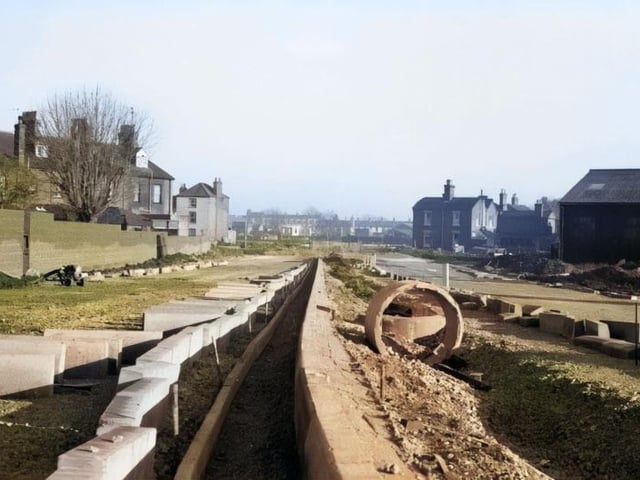 The construction of John Adams Way, in January 1977.