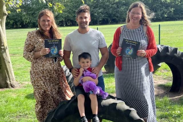 Ric Hart with Hugo and his teachers at Misterton Primary.