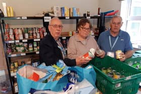 Boston Foodbank deputy manager Alan Green, volunteer Irene Green, and manager Bob Taylor.