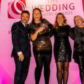 Michelle Roworth (second from left), owner of the Horncastle-based florist and events business, Rosedale House, picks up her award. (PHOTO BY: The Wedding Industry Awards)