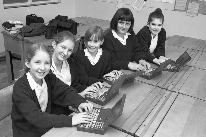 Youngsters at Boston High School taking part in a £2.55m national project which enabled pupils to borrow a laptop computer for homework. The school had been issued with 32 of the compact devices as part of a Government-backed scheme. The aim was to assess how such equipment might 'support, enhance and extend' pupils' learning. Each computer retailed for about £300 (£600 or so in today's money). In addition to helping pupils with homework, the machines could be used in lesson time. They were also compatible with a new pc network which had just been established at the school, the paper noted. Boston High School was the only school in Lincolnshire to be involved in the pilot. Pictured (from left) are Beth Allen, Dawn Addison, Caroline Massey, Katie Blackwell and Jodie Periam.