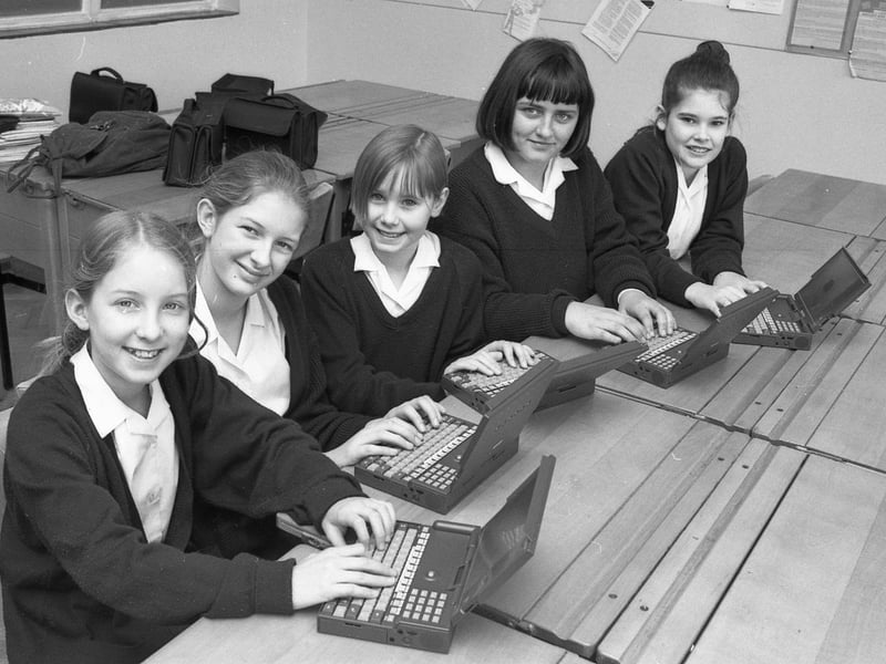 Youngsters at Boston High School taking part in a £2.55m national project which enabled pupils to borrow a laptop computer for homework. The school had been issued with 32 of the compact devices as part of a Government-backed scheme. The aim was to assess how such equipment might 'support, enhance and extend' pupils' learning. Each computer retailed for about £300 (£600 or so in today's money). In addition to helping pupils with homework, the machines could be used in lesson time. They were also compatible with a new pc network which had just been established at the school, the paper noted. Boston High School was the only school in Lincolnshire to be involved in the pilot. Pictured (from left) are Beth Allen, Dawn Addison, Caroline Massey, Katie Blackwell and Jodie Periam.