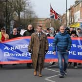 Campaigners marching through Skegness led by Alek Yerbury (left) and Scott Pittsy of Patriotic Alliance. Photo: John Byford