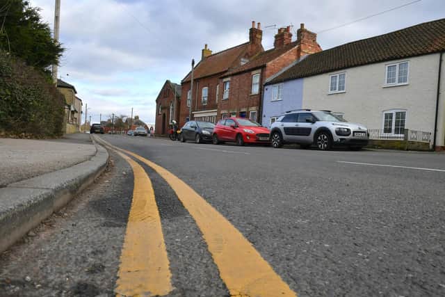 The double yellow lines painted in Bardney near the Post office.