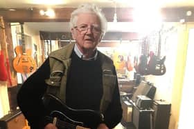 Norman holding Gary Kemp's guitar.