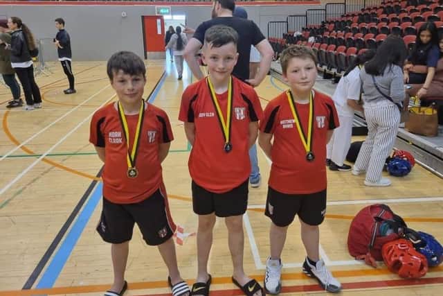 The Scorpion Taekwondo trio are pictured at the event in Spennymoor.