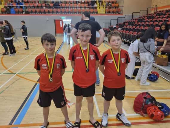 The Scorpion Taekwondo trio are pictured at the event in Spennymoor.