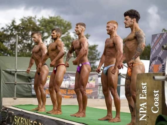 Showing their muscle are Studio 97 at the East Coast Fitness Festival.