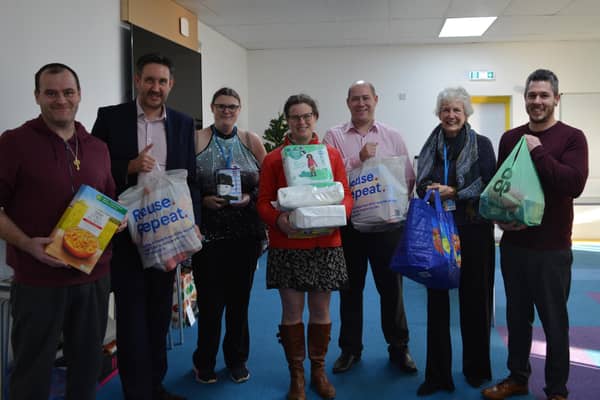 Nicholsons directors Richard Hallsworth, Kate Brown and Steve Robinson delivered items to the New Life Food Bank
