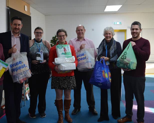 Nicholsons directors Richard Hallsworth, Kate Brown and Steve Robinson delivered items to the New Life Food Bank