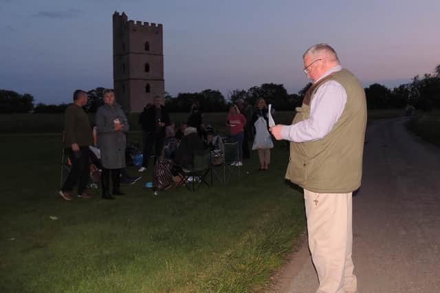 Reading out the jubilee proclamation to South Kyme villagers ahead of the lighting of their beacon on the tower.