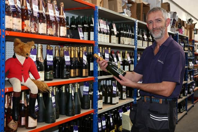Adam sorts out the champagne