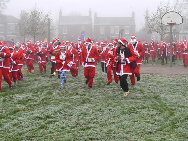 Action from this year's Boston Santa Run.