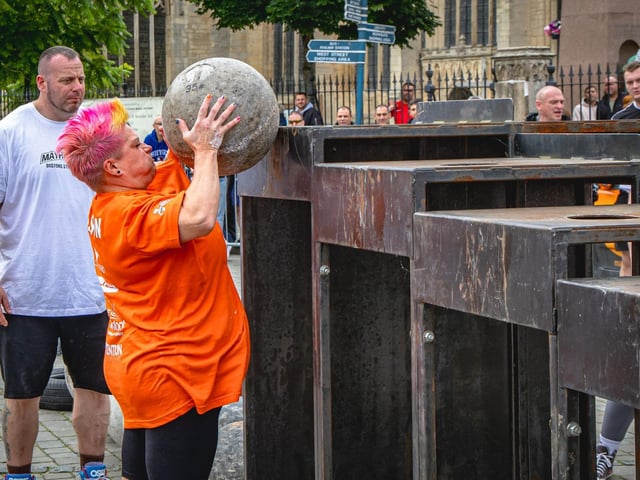 Kirsty Coulson, of Boston, loading a concrete atlas stone to a 5ft platform.