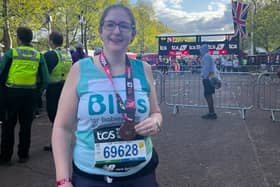Dr Caroline Johnson with her medal at the London Marathon finish line. Photo supplied