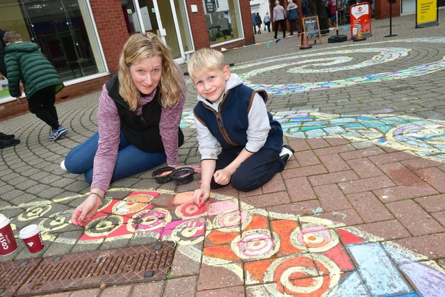 Anna Skeith and Reuben Skeith 8 of Sleaford trying the Italian chalking art in Riverside Precinct.