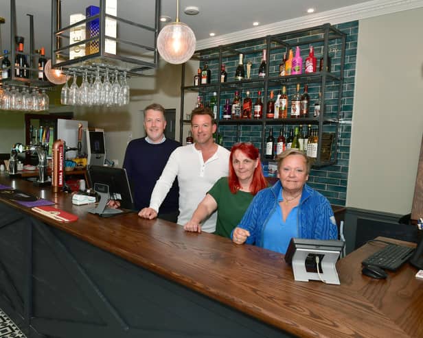 Coastfields bosses behind the new bar at Addlethorpe Golf and Country Club are David Honman, business manager, Lloyd Silvester, managing director, golf club manager Carol Hallgarth and Lynda Silvester, chairman.