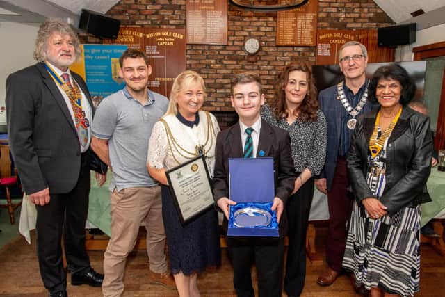 Reece Revell with his Rotary Club Children of Courage Award. Photos by John Aron.