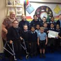 Pupils at Boston's St Nicholas CofE Primary Academy with Louise Curtis, learning mentor/DDSL.
